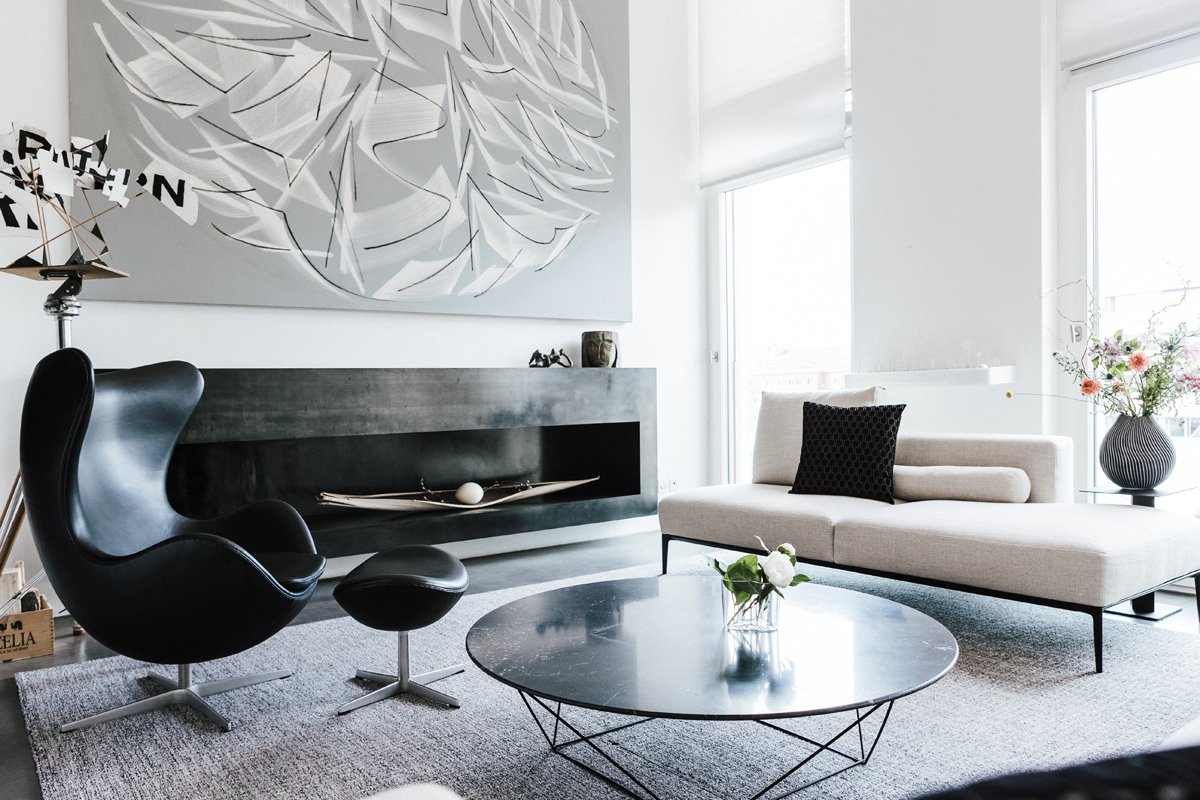 Referenz einer Wohnzimmereinrichtung mit Möbeln von Walter Knoll und Fritz Hansen